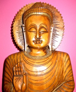 We must do the freeing ourselves... - Photo of carved wooden Buddha by Jan Ketchel